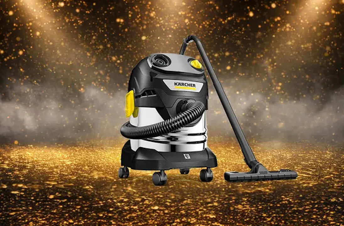 Kärcher Nass-/Trockensauger WD 4 S Go!Further – schwarzes Jubiläumsmodell vor elegantem Gewinnspiel-Hintergrund