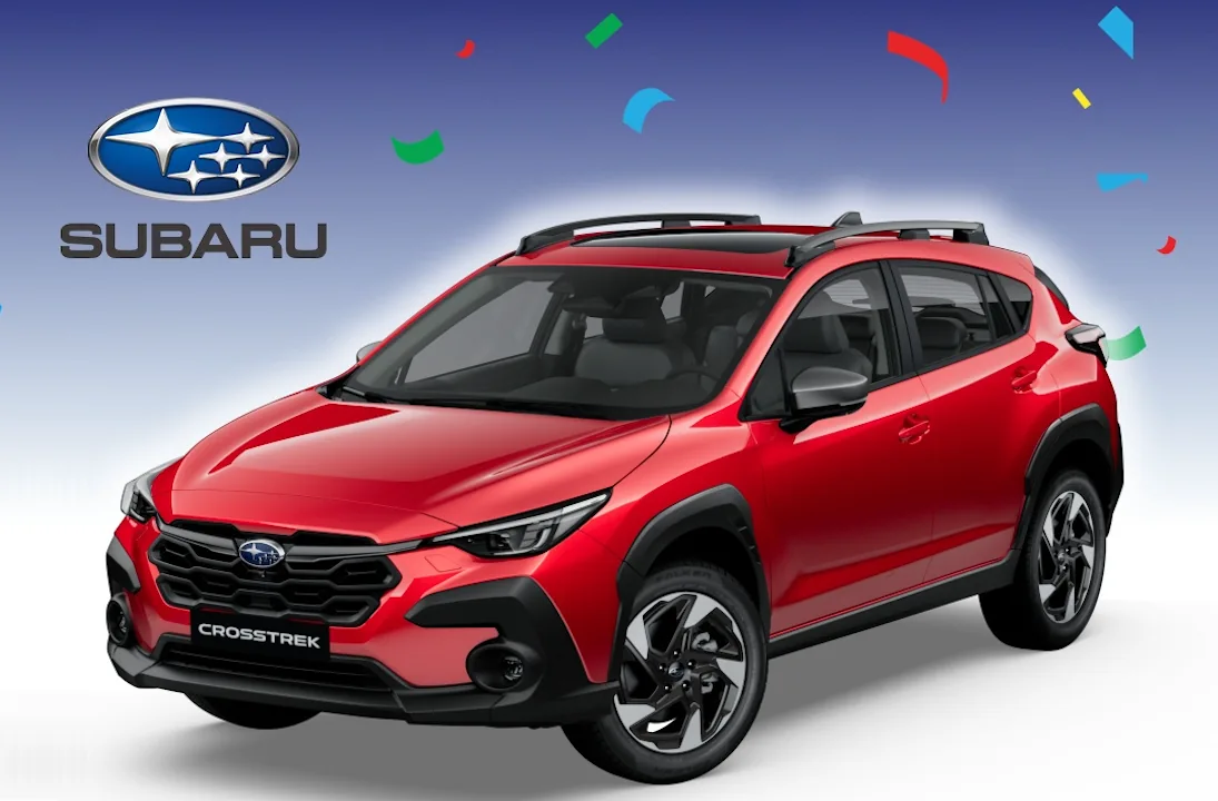 Roter Subaru Crosstrek 4×4 mit Subaru-Logo und Konfetti – Hauptpreis des QUALIPET Jubiläums-Gewinnspiels QUALI-WIN